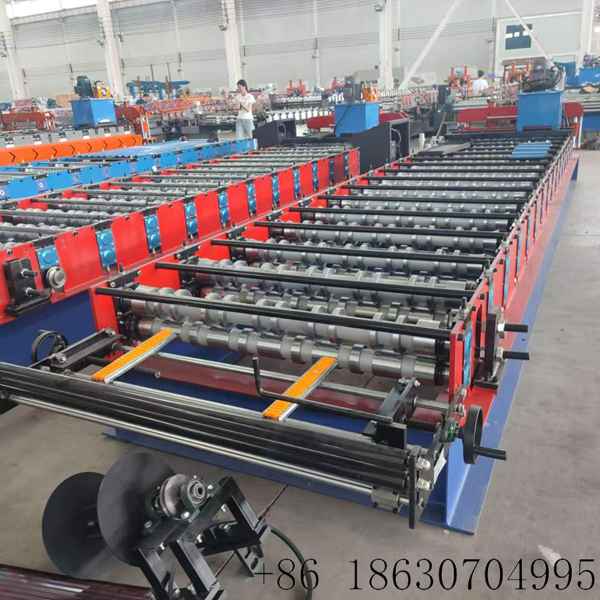 High efficiency 980 trapezoidal roofing sheet roll forming machine from Xinnuo for Brazil warehouse project