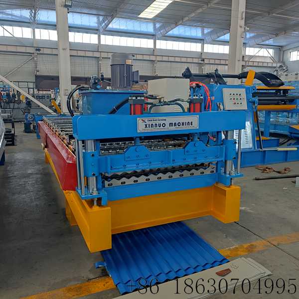 Hebei Xinnuo automatic 855 corrugated roof panel forming machine for Bolivian construction factory