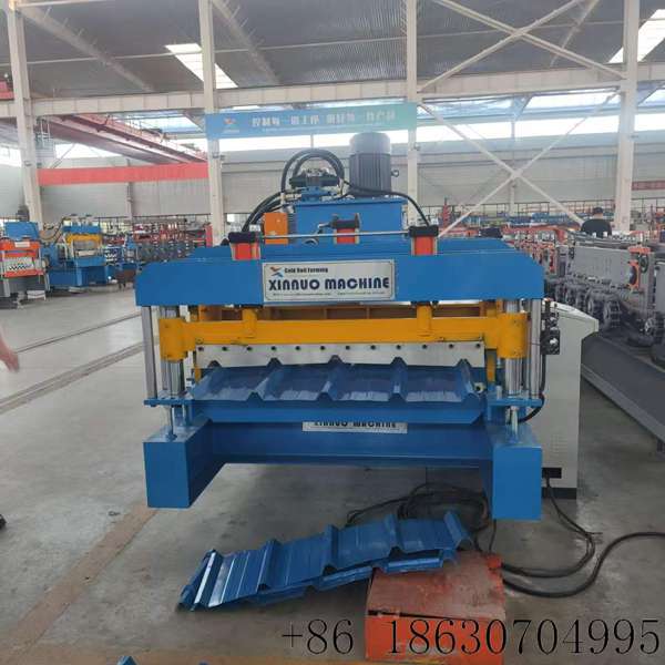 Hebei Xinnuo Cuba 1000 trapezoidal metal roofing sheet roll forming machine full production line view.
