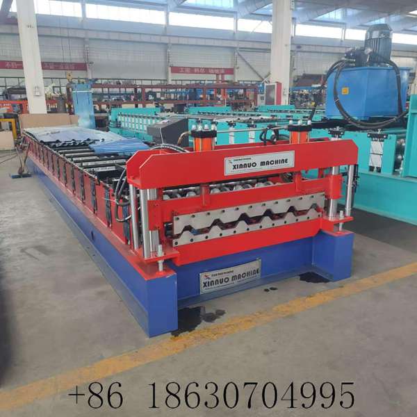 Brazil 980 trapezoidal roof panel roll forming machine from Hebei Xinnuo factory