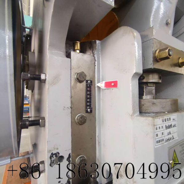 PLC control system with counter and fault alarm on industrial stamping press