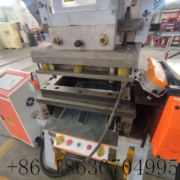 Precision positioning scale adjustment device on 63 ton mechanical punch press