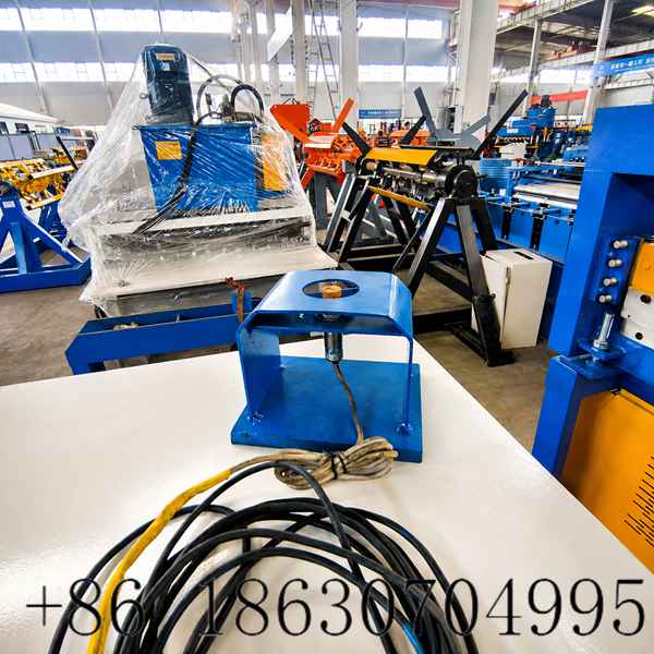 Induction sensor auto stop device for electric decoiler machine