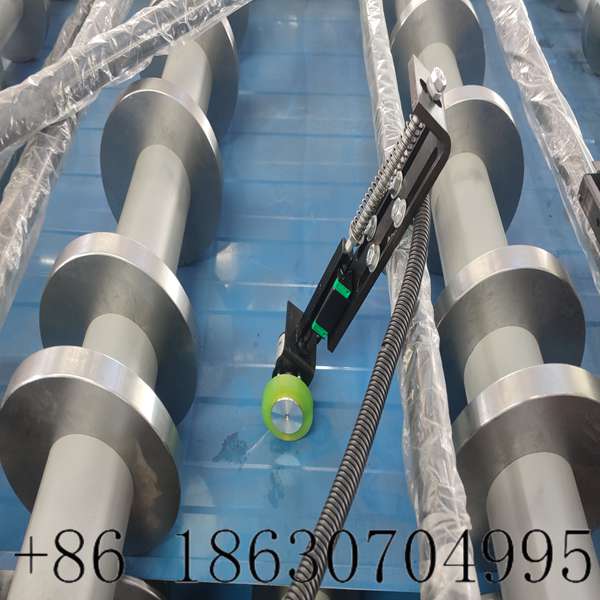 Length counter for metal sheet forming machine