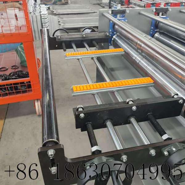 Feeding platform for standing seam roof roll former