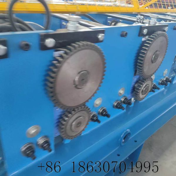 Xinnuo C purlin forming machine side profile view gear and chain drive system layout