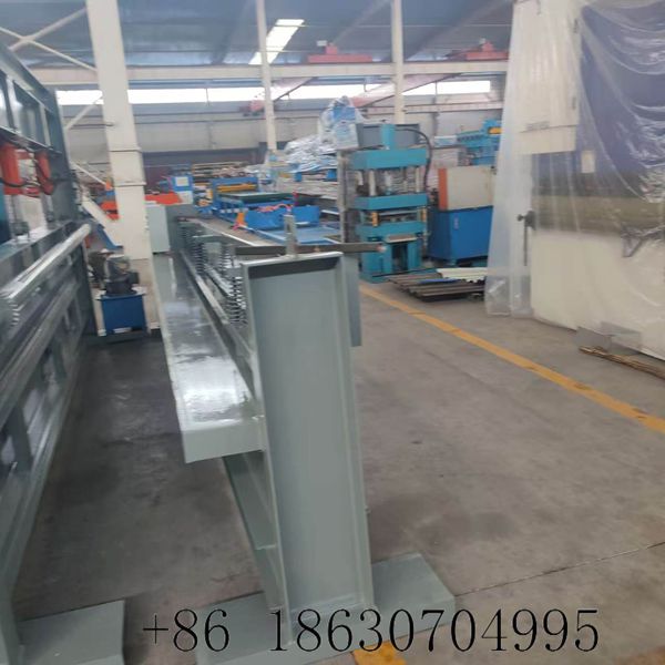 Side profile full view of hydraulic shearing machine whole workshop layout structure