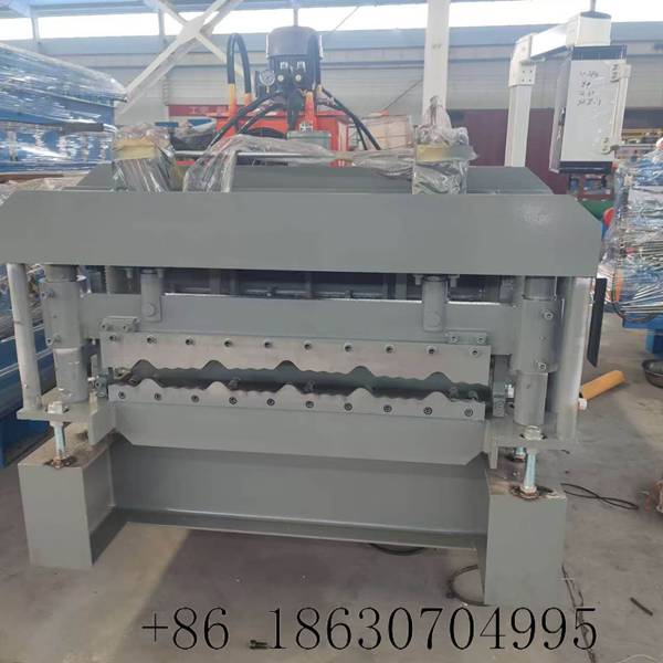 Fully automatic 748mm multi-wave glazed tile roll forming machine overview with heavy-duty structural steel frame and precision-aligned forming rollers