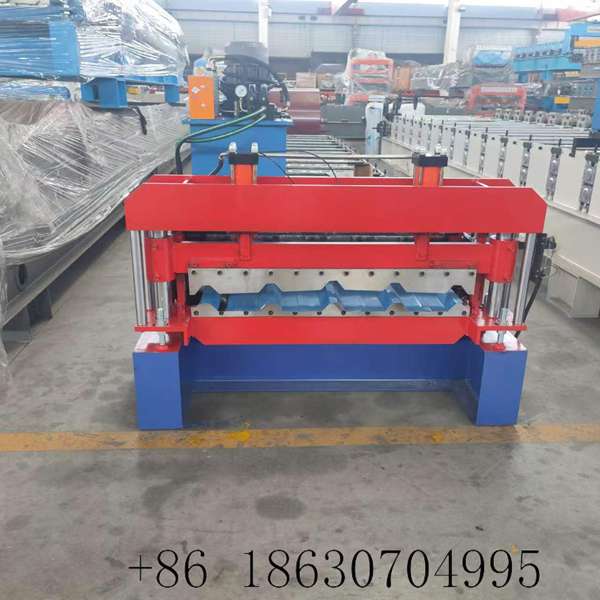 1020 IBR roof sheeting machine front view showing complete 14-row roll forming line with 350H steel frame, hydraulic cutting station, and finished panel output
