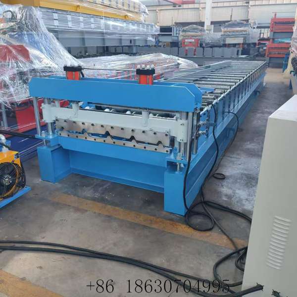 Front view of the 1000 trapezoidal metal roof panel forming machine producing 1000 mm IBR roof sheets