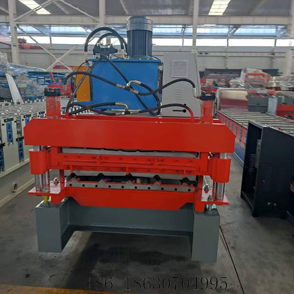 Front view of the double profile roof panel roll forming machine with the upper and lower forming stations in one frame
