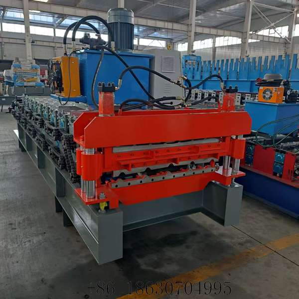 Full front view of the 840+900 double profile roof panel roll forming machine showing both forming layers and the hydraulic cutting head