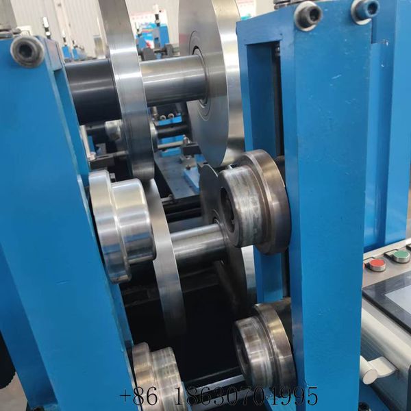 Forming rollers of the automatic CZ purlin roll forming machine used to shape steel coil into C and Z purlin profiles