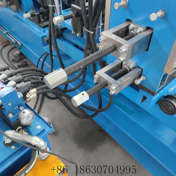 Lead screws with lock nuts on the punching station used to set purlin web and flange position