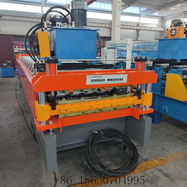 Front view of the 840+840 stainless steel double layer roof panel machine with XINNUO nameplate