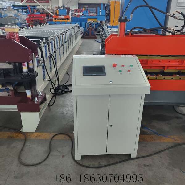 Electrical control cabinet and PLC operating panel of the roof panel roll former with emergency stop and hydraulic controls